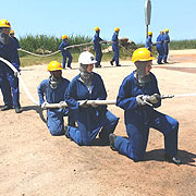 FIRE FIGHTING STUDENTS IN POSITION.