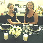 2 OF OUR STEW GIRLS SHOWING OFF THEIR TABLE ARRANGEMENTS AND READY TO TAKE ON THE INDUSTRY.